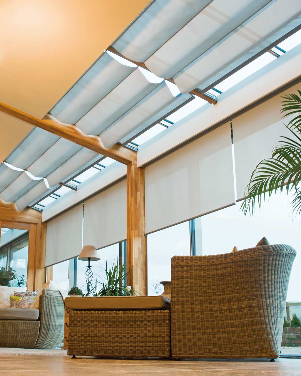Open living with conservatory and skylight blinds